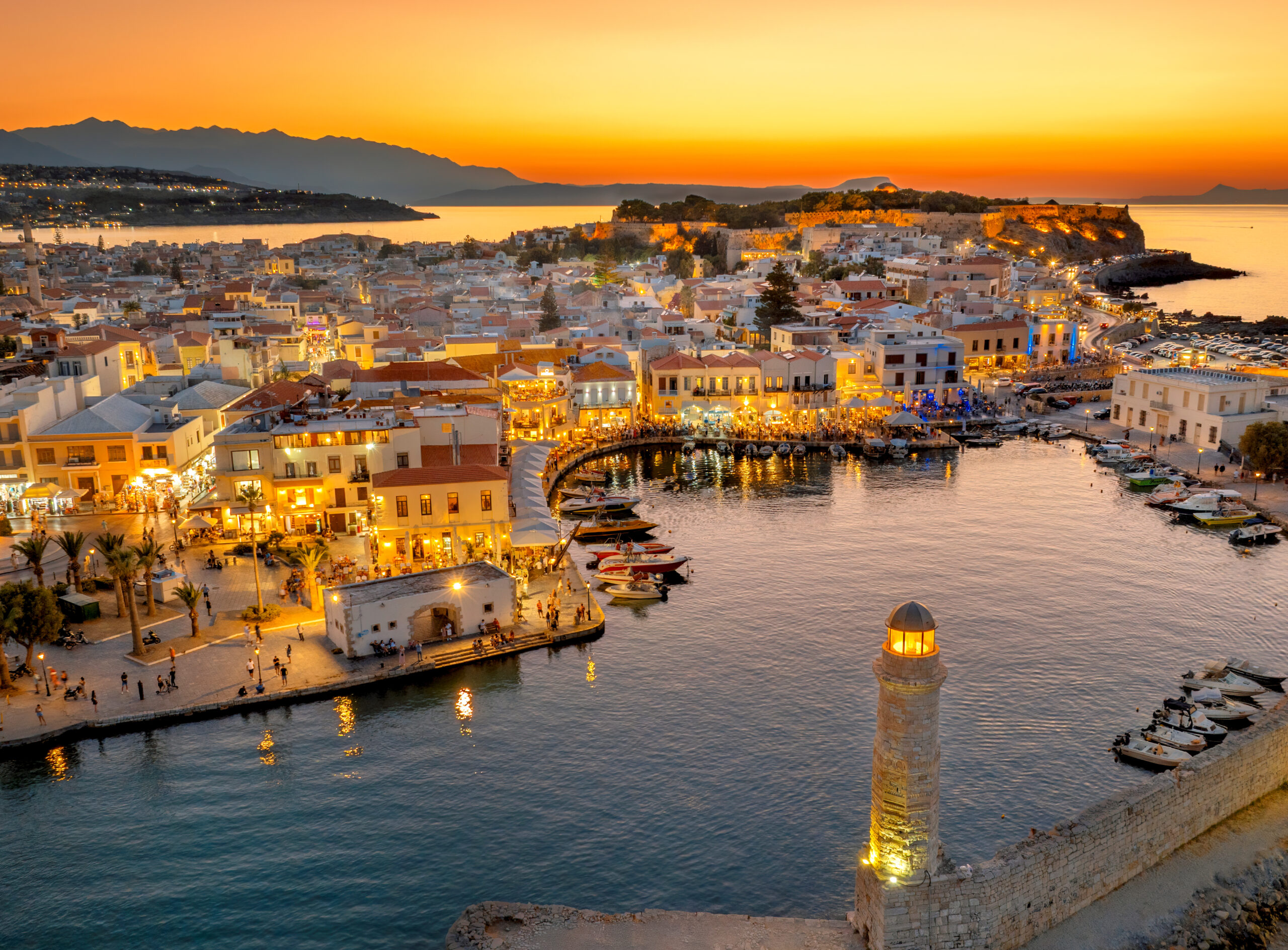 rethymno city at crete island in greece. aerial view of the old venetian harbor and venetian fortezza castle